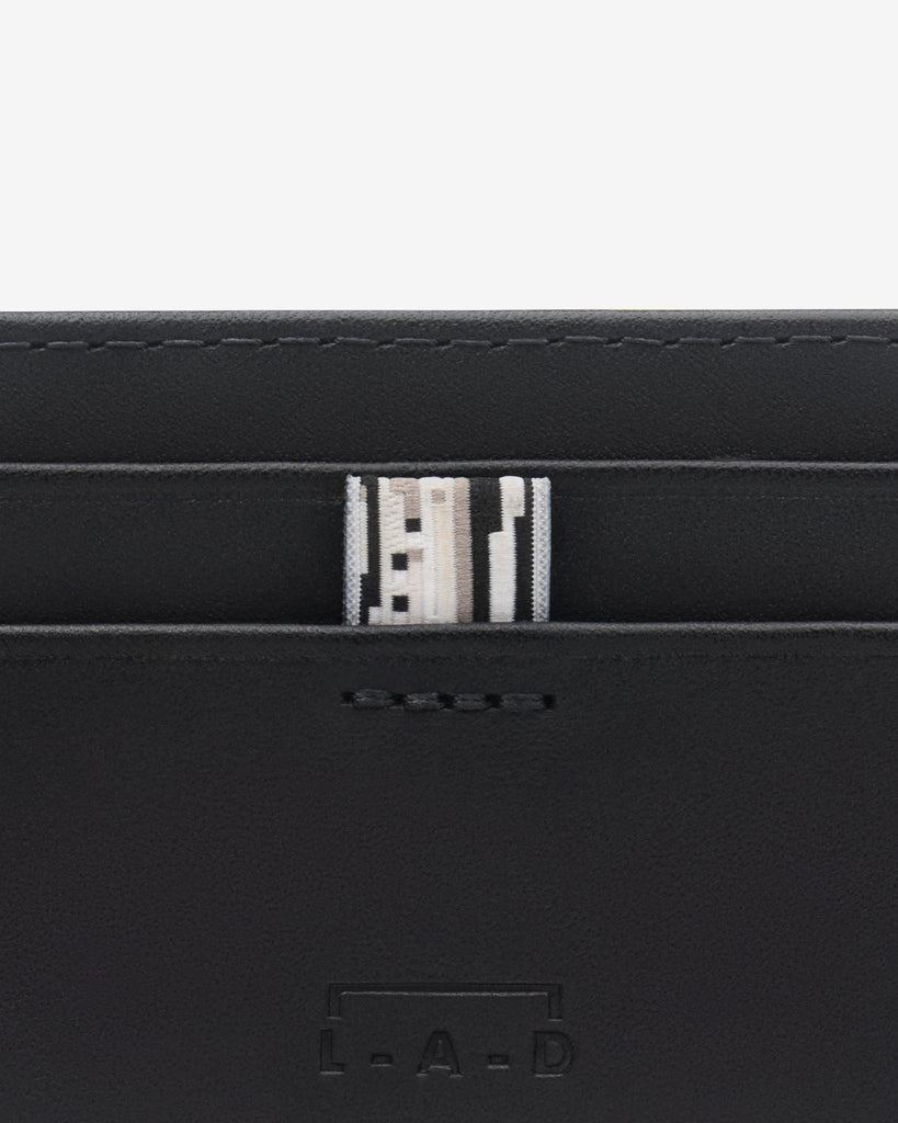 Tarjetero piel Doble L - A - D® - Detalle de la piel y costuras